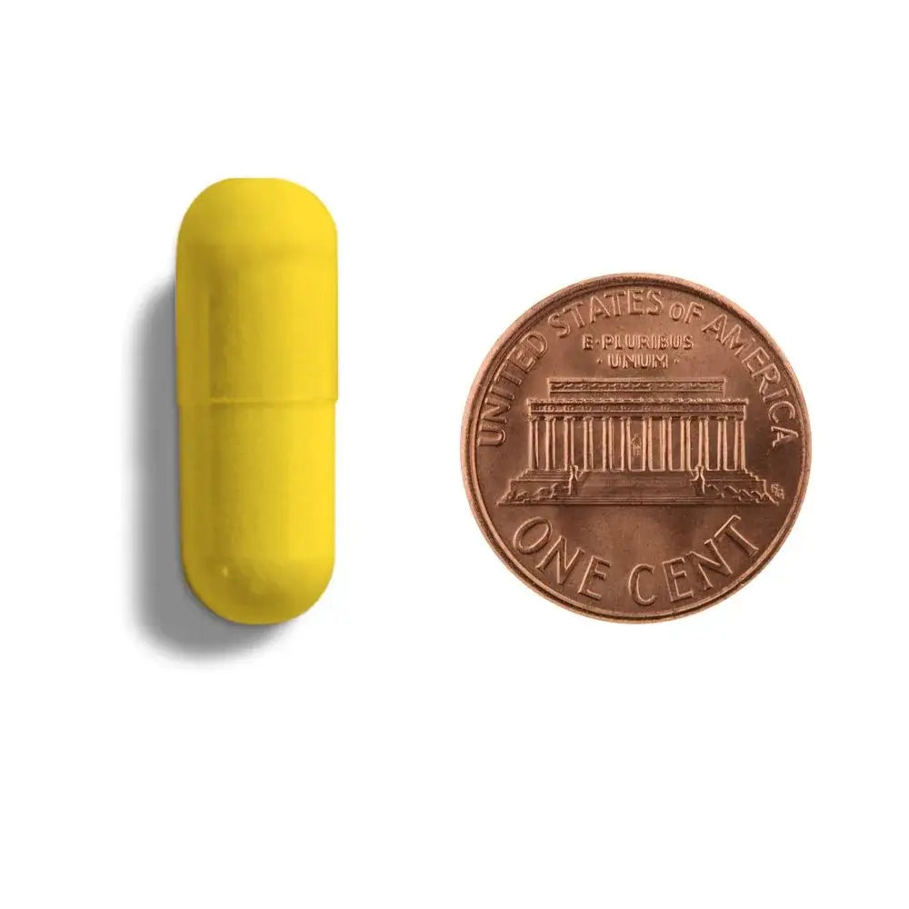 berberine plus tablet next to a penny