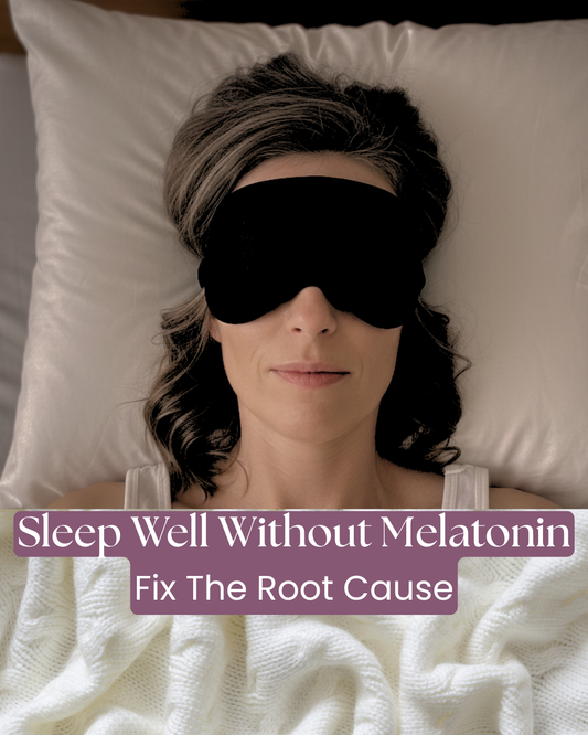 Adult sleeping peacefully on their back in a luxurious bed with a silk sleep mask on, demonstrating deep, restorative sleep.