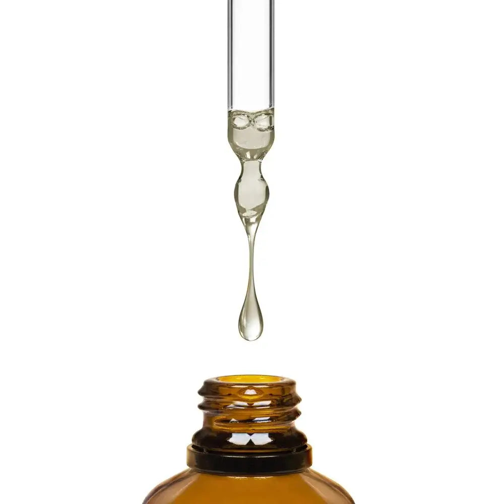 Close-up of Sunshine Drops liquid Vitamin D3 showing the lipid-mediated oil base for superior bioavailability.